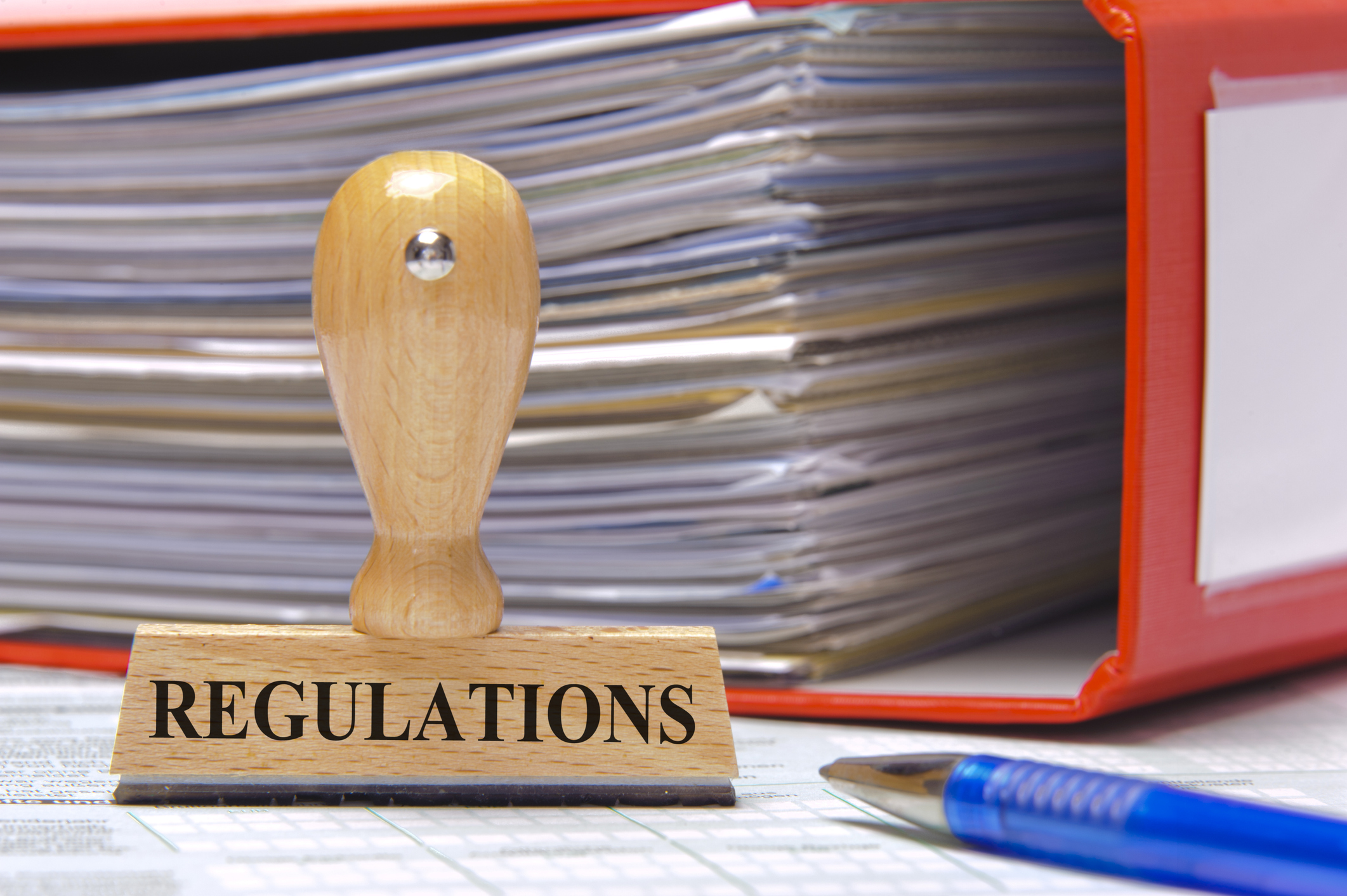 regulations marked on rubber stamp